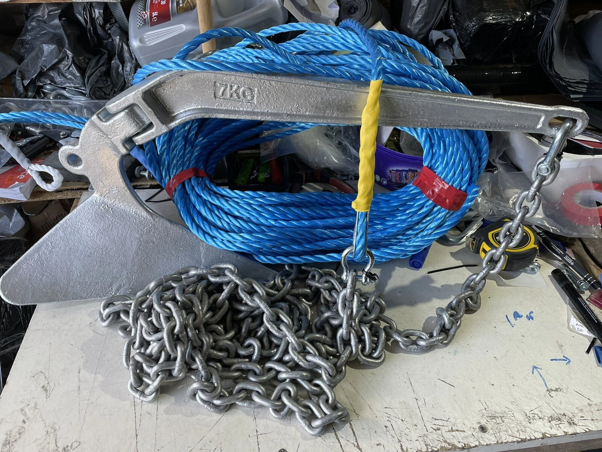 Representative complete plough-style boat anchor kit with chain and rope